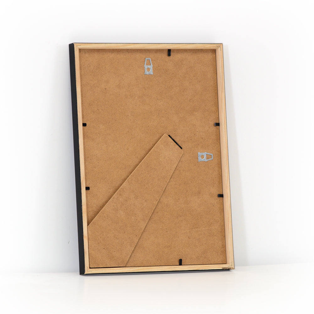 Back of a black wooden frame, size 21x30 cm, with stand and wall hanging hardware.