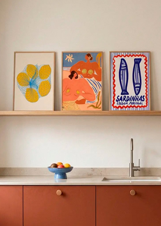 5 Lemons in a Net, Lemon and Melon and Lisbon Sardines posters styled on a kitchen shelf in a Scandinavian kitchen
