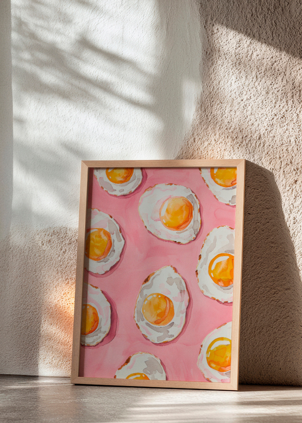 Whimsical kitchen poster titled "Fried" featuring sunny-side-up eggs on a vivid pink background, ideal for adding color and fun to your home decor.