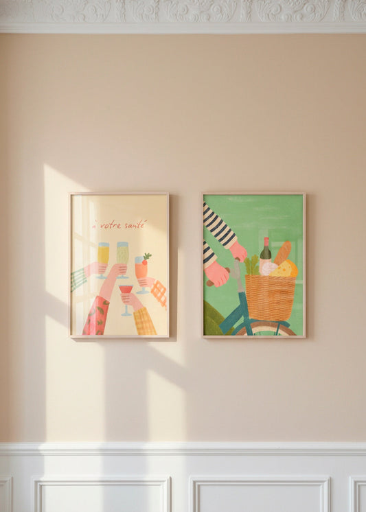 Sunlit wall with the “À votre santé” and “French Picnic” posters in oak frames, adding a warm and inviting look.