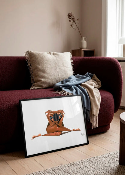 Abstract Geometric Splits by Manasseh Johnson Sr. – framed figurative art poster featuring a woman in a full side split with black geometric details, styled in front of a deep burgundy sofa in a warm neutral living room.
