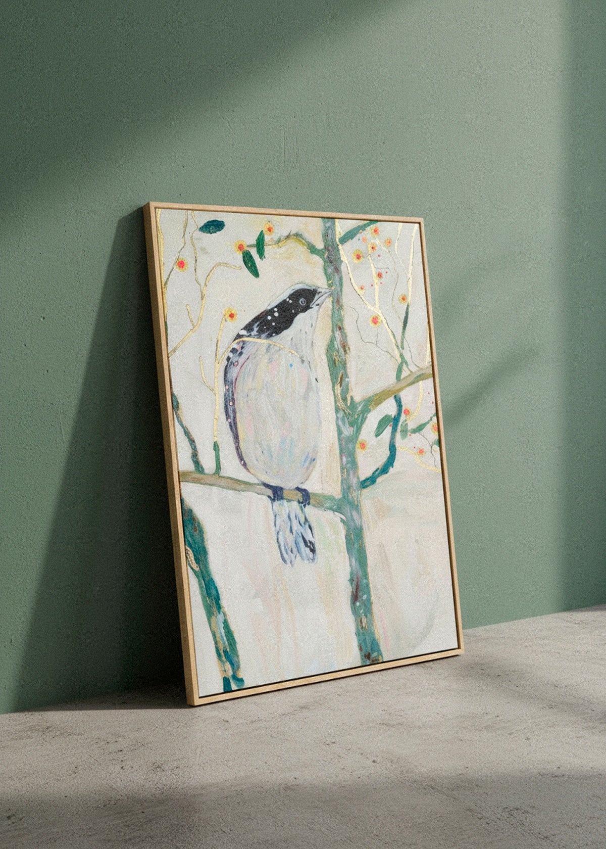 Bird no. 3 canvas print hanging above a sofa in a bright room with natural shadows and beige tones.