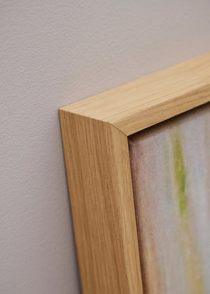 Nærbillede af solid egetræsramme til lærredstryk – kvalitetsramme fra HelloPoster