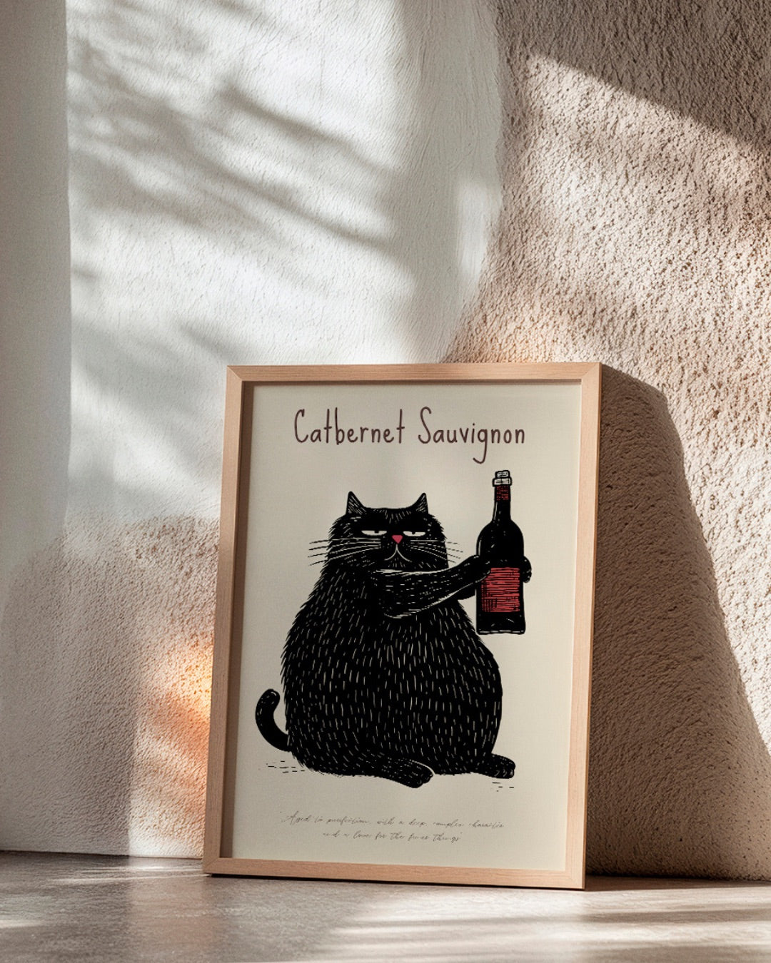 'Catbernet Sauvignon' poster by HelloPoster, showing a humorous black cat with a bottle of red wine. A quirky kitchen print ideal for wine lovers and cat fans.