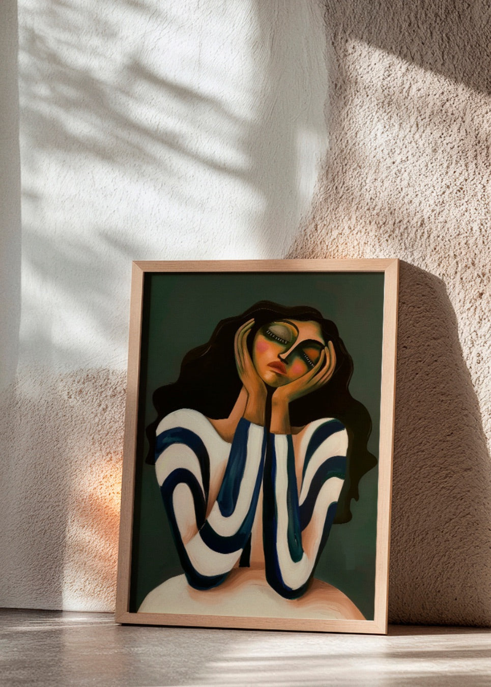 Abstract portrait poster titled "Daisy" showcasing a woman with bold green background and wavy striped top, styled in a bright Scandinavian interior.