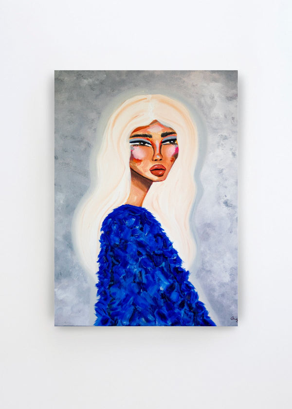 Elegant Blue Fashion by Amy Straley art print featuring a woman with long white hair, dramatic makeup and a richly textured cobalt blue outfit against a soft grey background.