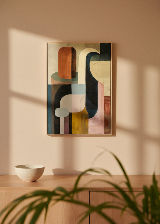 Harmonious geometric abstract canvas artwork displayed above a wooden sideboard in a sunlit beige interior, featuring warm shadows and soft earth-tone decor.