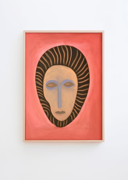 Poster of an abstract tribal-inspired mask with coral red background and striped hair-like design, framed in light wood.
