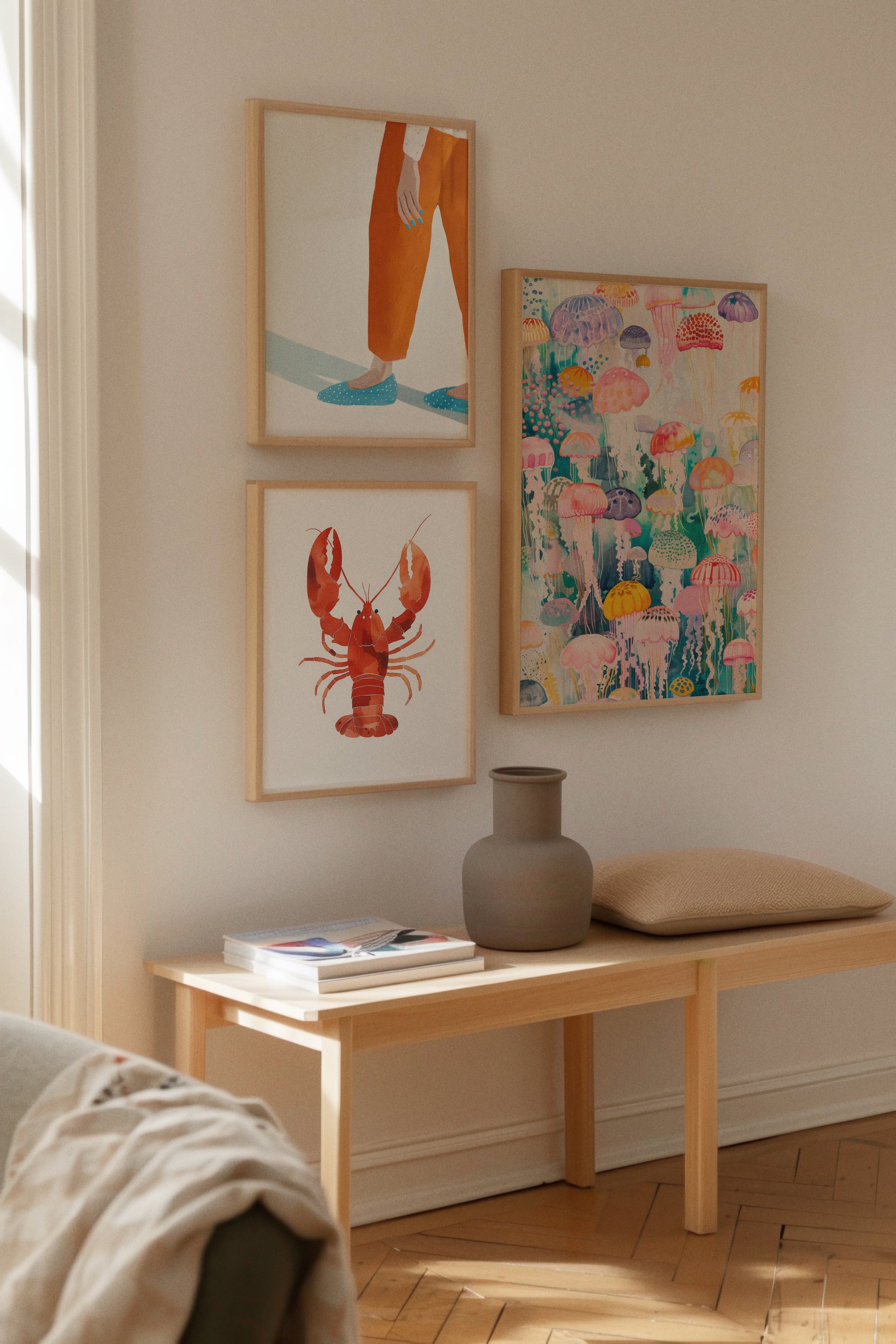 Moody Nails, Lobster & Under Water – Playful Poster Wall
Bright and colorful poster wall with a close-up of a woman’s feet in orange pants ("Moody Nails"), a bold red watercolor lobster ("Lobster"), and a dreamy underwater scene of colorful jellyfish ("Under Water").