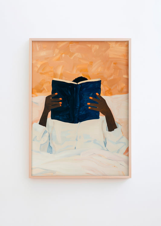 Illustration of a person with orange nails reading a blue book in bed, in warm, cozy tones