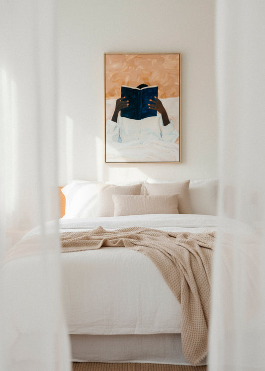 “Must Read” canvas print displayed against a light wall with flowers in the foreground, radiating calm and mindfulness.