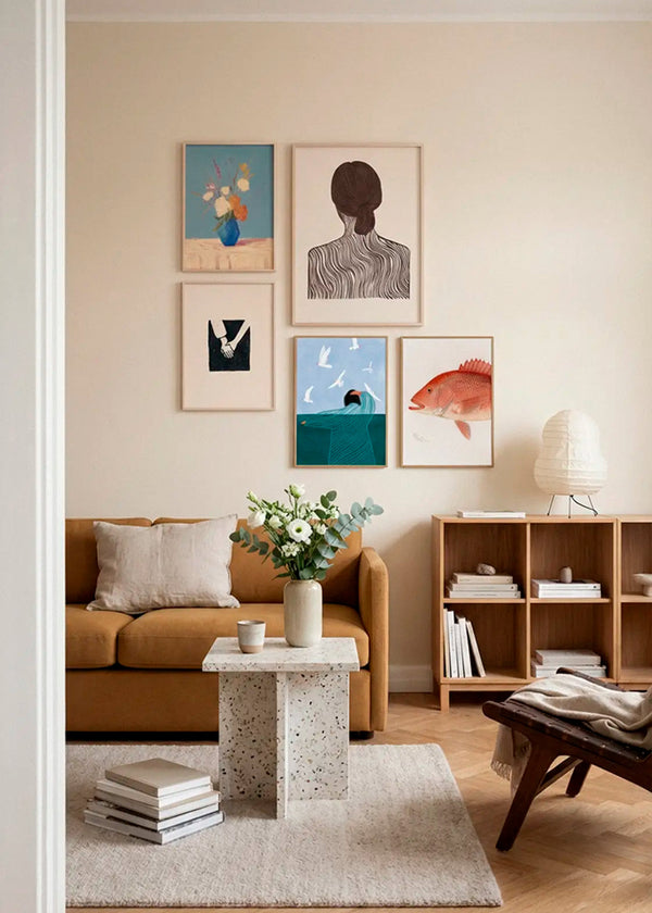 Centerpiece, Quietly Yours, Togetherness, Sea Side Serenity and Red Snapper posters styled as a curated gallery wall in a Scandinavian living room
