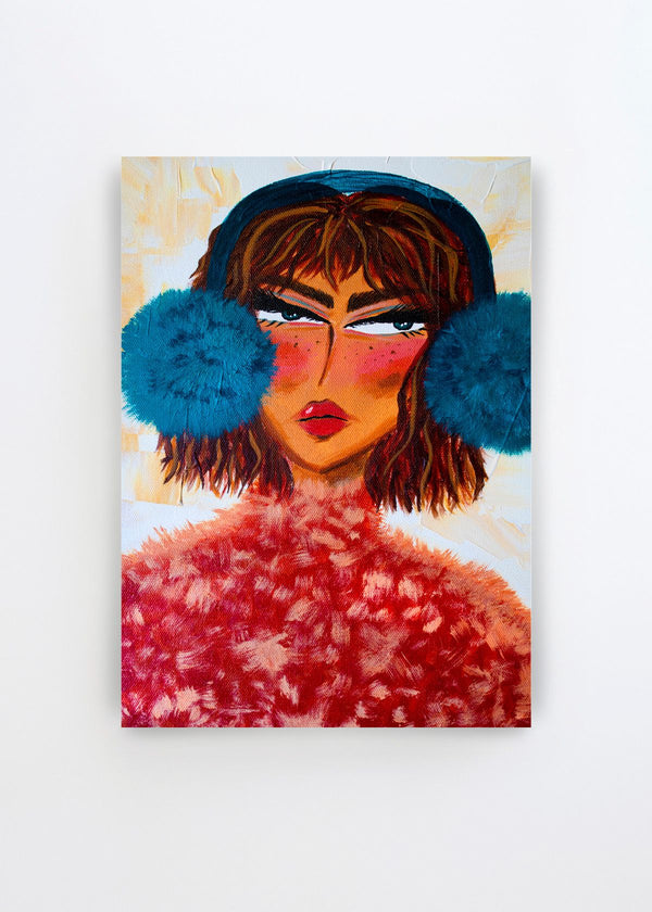 Sassy Earmuffs Portrait by Amy Straley art print featuring a woman with dark hair, bold blue earmuffs, dramatic makeup and a textured red and pink outfit against a light background.