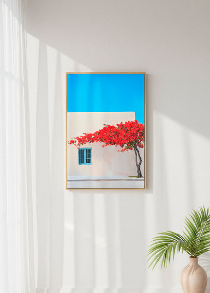 “Sheep Farm” canvas print beside a rustic wooden chair and a green plant, styled in a minimalist Scandinavian space.