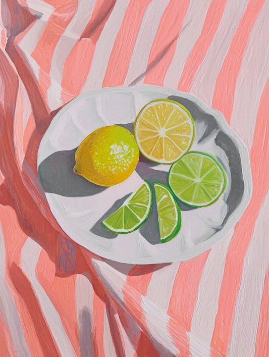 Poster with sliced citrus fruits on a white plate and striped background – ideal for kitchens or vibrant interior spaces.