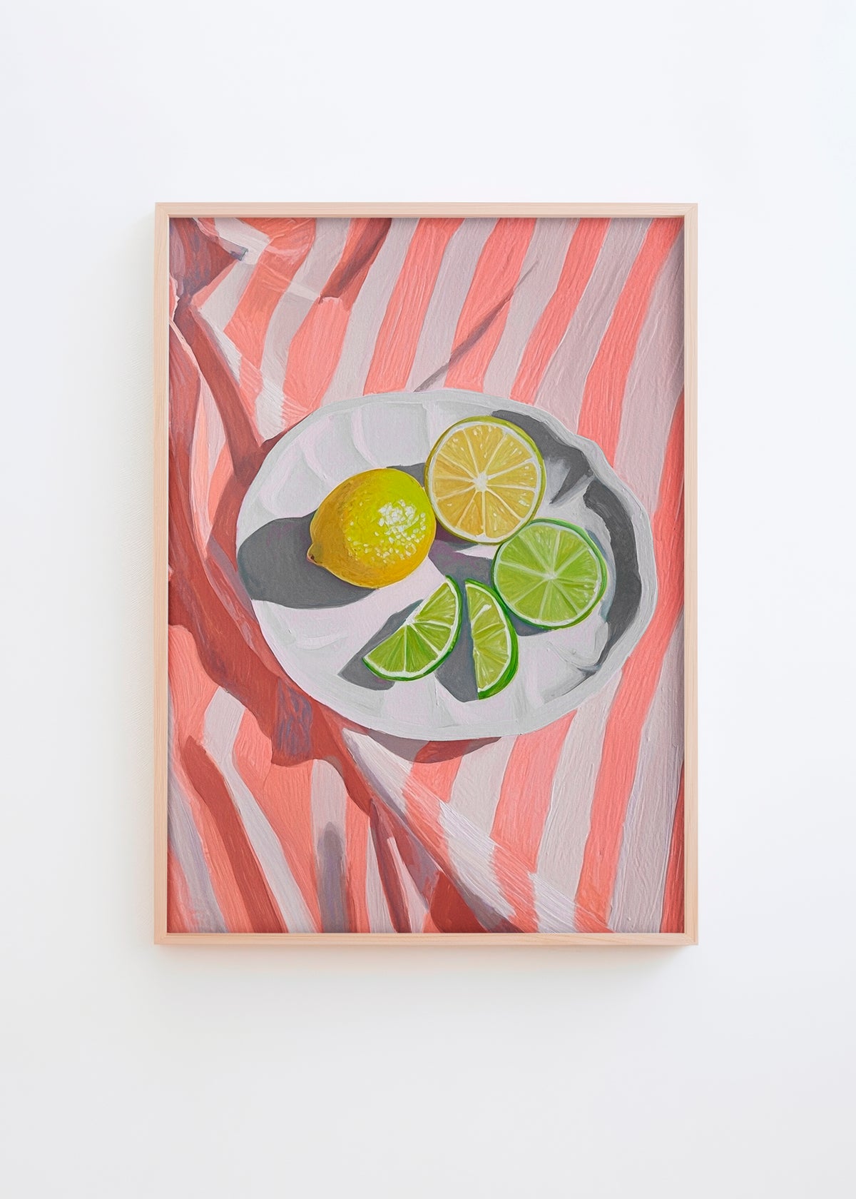 Poster with sliced citrus fruits on a white plate and striped background – ideal for kitchens or vibrant interior spaces.