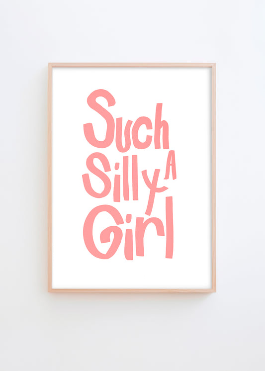Such a Silly Girl poster featuring playful pink typography on a white background, framed in solid oak.
