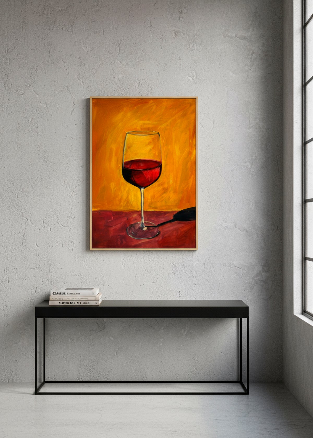 Red wine glass artwork displayed on a light grey concrete wall above a black console table.