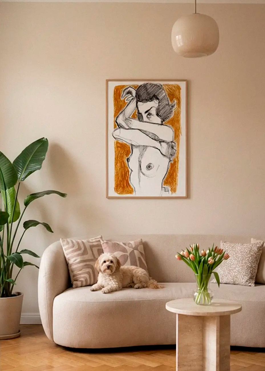 Crossed Arms poster styled above a sofa in a warm Scandinavian living room