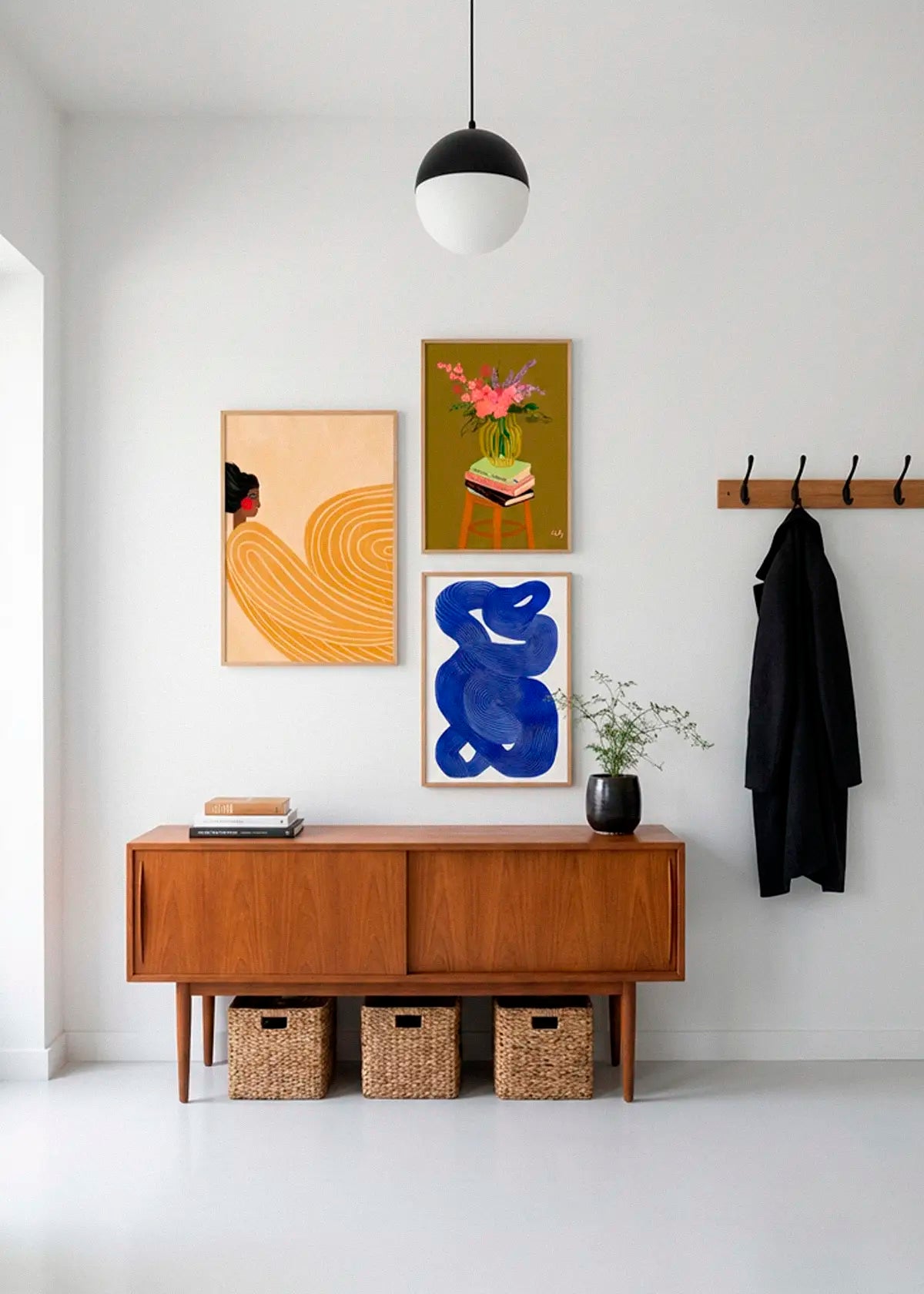 Girl with the Yellow Stripes, Vase and Shape no. 10 posters styled together in a calm Scandinavian hallway interior