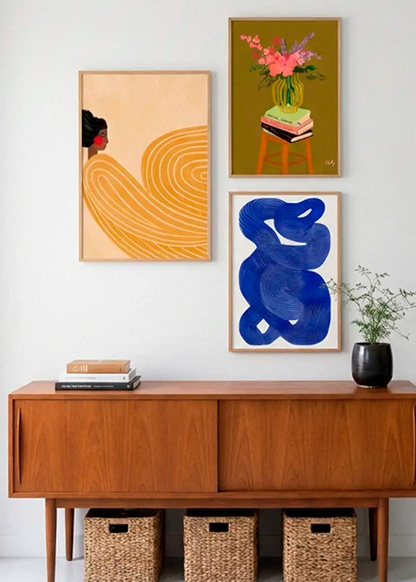 Girl with the Yellow Stripes, Vase and Shape no. 10 posters styled together on a white wall in a Scandinavian interior