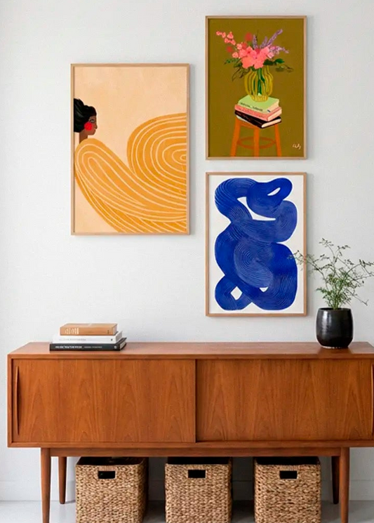 Girl with the Yellow Stripes, Vase and Shape no. 10 posters styled together on a white wall in a Scandinavian interior