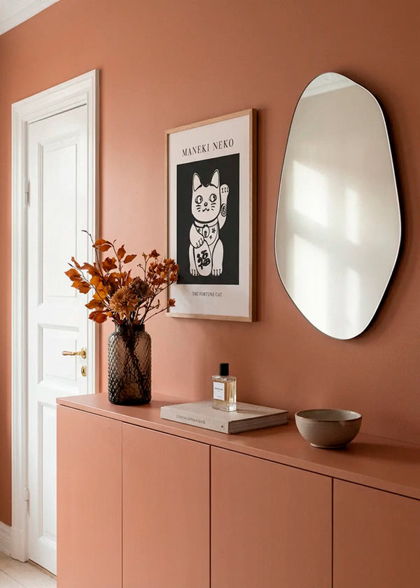 Maneki Neko poster styled in a warm Scandinavian entryway with soft colours and natural light