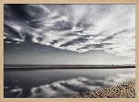 Lone Walker on Reflective Beach – B2B