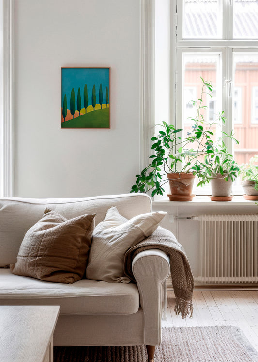 Trees poster in a cozy Scandinavian-style living room – A vibrant, minimalist landscape poster, perfect for brightening up a calm, nature-inspired space.