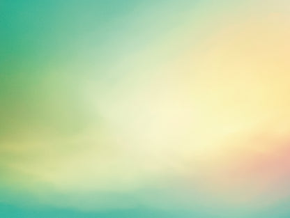 Close-up of a turquoise to yellow gradient design with soft color blending and pastel tones.